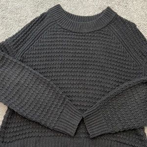 Woman’s charcoal gray sweater. Never worn 60% cotton 40% acrylic.